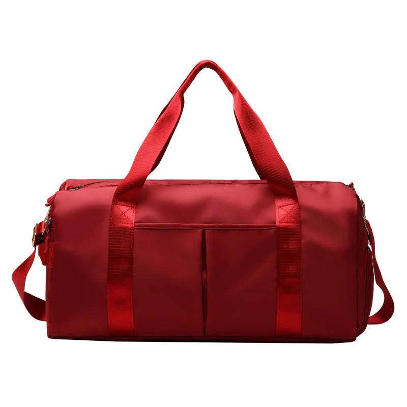 red waterproof fitness duffel bag with multiple compartments and shoulder strap for travel and sports
