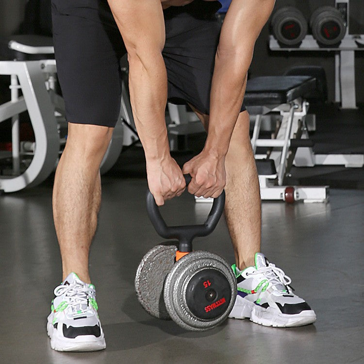 Man using dumbbell barbell converter with kettlebell handle in gym setting